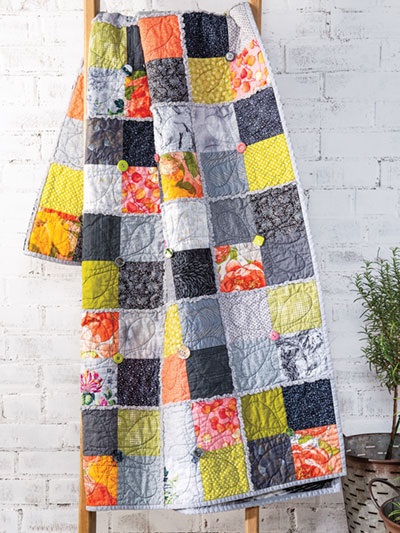 Isn't this quilt simply gorgeous? But if these colors aren't to your taste, or wouldn't match your decor, remember that you can use ANY colors and fabrics you like when you make your own quilt. This pattern is SO EASY to re-color if you need different colors! And it's a beginner-friendly quilt pattern -- so if you've never made a quilt before, this is a fantastic project to get started with. The pattern is included in Farmhouse-Style Quilting by Annie's.