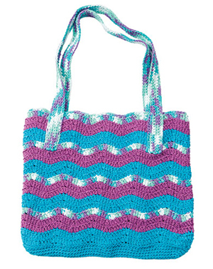 Here you can see Crochet Ripple Stitches Worked in the Round Through the Back Loops; This project is the Crochet Ripple Tote Bag Pattern From Sharon Silverman's Learn to Crochet Ripples Class.