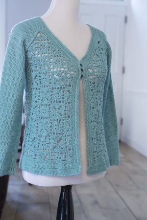 Muriel crochet lace cardigan pattern designed by Robyn Chachula. The crochet pattern for this lovely sweater is included in Delicate Crochet, published by Stackpole Books.