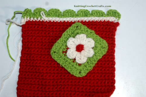 Here I'm just playing around with ideas for Christmas projects. I've crocheted a small flower granny square and a larger square of single crochet in Christmas colors. The edging is a variation of the scalloped crochet edge pattern posted on this page; it includes an extra row of single crochet and surface crochet slip stitches worked in a contrasting color.