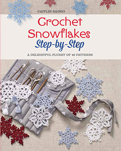 Crochet Snowflake Patterns by Caitlin Sainio, Published by St. Martin's Griffin; many of these patterns would make excellent snowflake coasters if you crocheted them in medium-weight yarn.