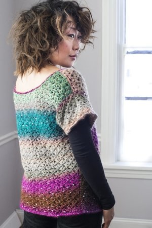 Flirt Short-Sleeved Crochet Cardigan Sweater Pattern Designed by Karen McKenna for Delicate Crochet, published by Stackpole Books.