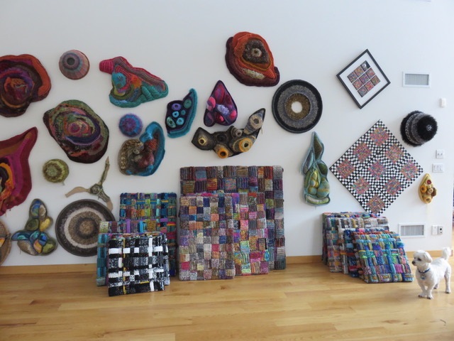 Here you can see a delightful, colorful assortment of freeform crochet art pieces by Ronni Howard. The photo and artwork are both copyright Ronni Howard. I’ve used this photo with her permission.
