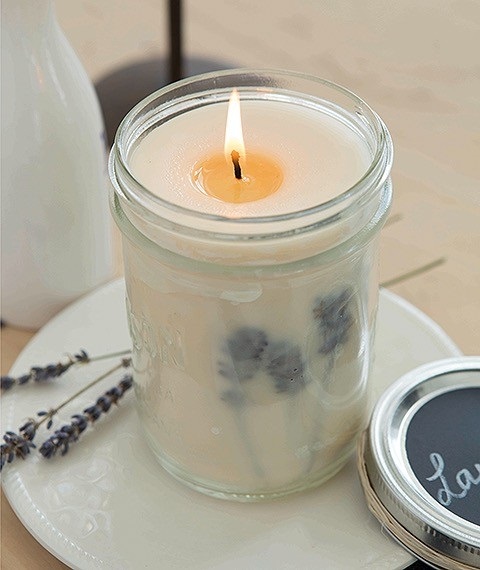 You'll learn how to make fragrant lavender scented candles like this one from the instructions in <em>Home Candle Making</em> by Stephanie Rose, published by Leisure Arts