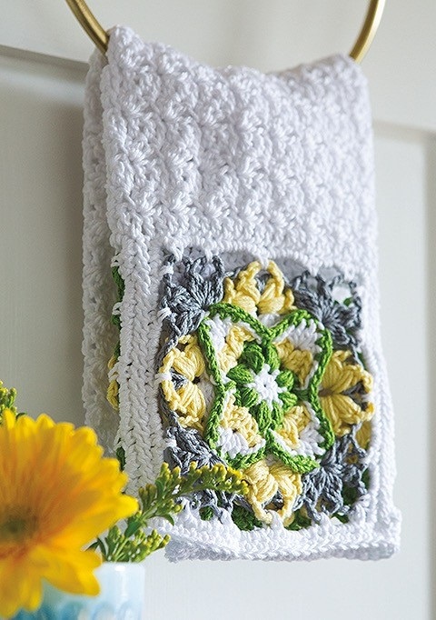 Imagine how impressed your friends and family will be when they see a set of these lovely hand towels hanging in your powder room. You could make towels just like these using a pattern from Overlay Crochet by Kristi Simpson, published by Leisure Arts. If you plan to entertain during the holidays this year, consider whipping up a set of these lovely towels before the holiday rush, so you can have them ready for people to use next time you invite invite people over to your place. If you want to make them specifically for Christmas, you could use a dark green yarn in place of the gray yarn, and red yarn in place of the yellow yarn -- and voila, you have a Christmas colorway.