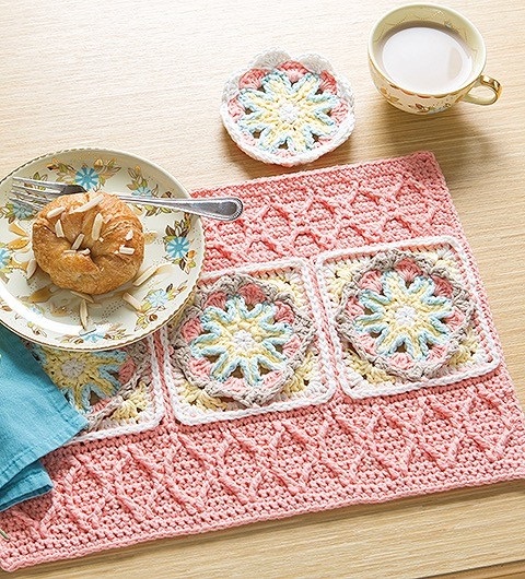 Protect your table from spills and drips with these richly textured coasters and placemats. You'll find the patterns for making this lovely set in Kristi Simpson's new book called Overlay Crochet, published by Leisure Arts.