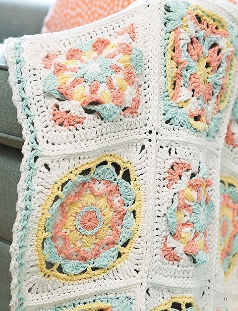 This gorgeous granny square blanket is extra interesting, thanks to the use of the overlay crochet technique to layer yarn colors overtop of each other. The finished blanket measures 26" x 42". It requires 4 colors of medium-weight yarn plus a size J / 6 mm crochet hook. Get the pattern for crocheting this afghan in Overlay Crochet by Kristi Simpson, published by Leisure Arts.
