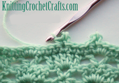 Picot Crochet Instructions -- Your picot stitch is complete at this point. What you do next depends on the pattern you're working from. Here, I anchored the picot to the fabric with a single crochet. Next, I'll resume working slip stitches.