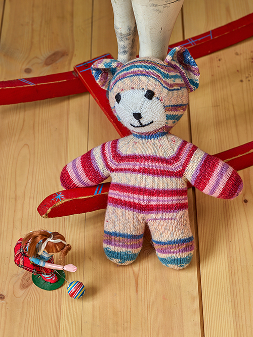 This sock yarn teddy bear is one of the designers' most popular patterns. The pattern was originally published in a previous book of theirs. For this book, they've reworked the teddy bear to make some improvements to the pattern. Get the updated pattern in Arne & Carlos Favorite Designs, published by Trafalgar Square Books. Photo is courtesy of the publisher and is reprinted here with their permission.