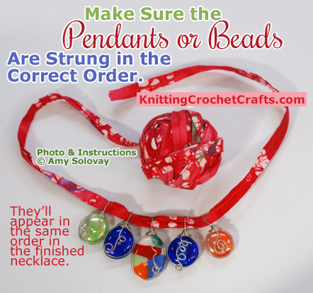 Make sure the pendants or beads are strung in the correct order. They'll appear in the same order in the finished necklace.