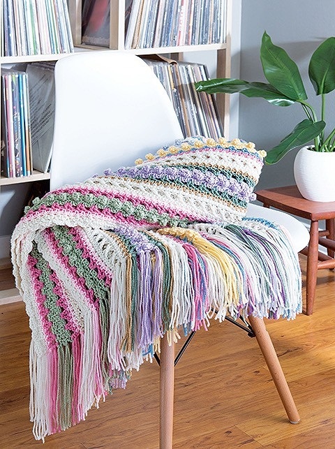 Textured strips scrap crochet afghan pattern from the book Scrappy Afghans, published by Leisure Arts