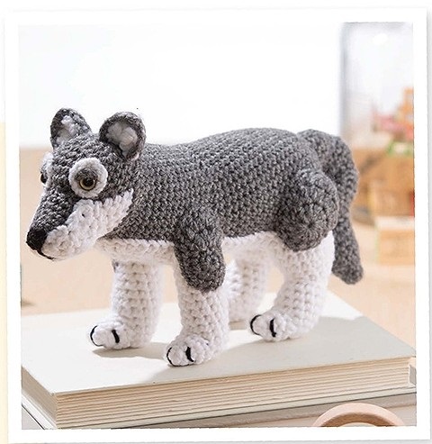 This is the crocheted wolf my niece has fallen in love with. Want to make one of these for a child you love? Grab the pattern in a brand new crochet pattern book called Amigurumi, an Adorable Collection, published by Leisure Arts.