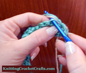 Neatly, Carefully Pull the Loose Ends Through the Piece of Crochet Several Times, Working Through the Stitches That You Will Crochet Into When You Do the Next Row.