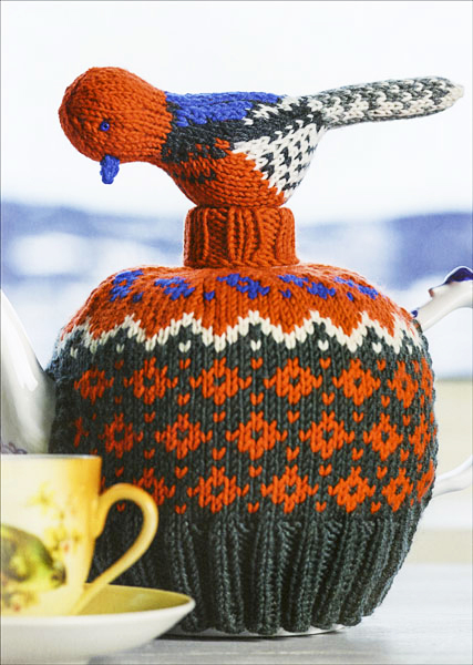 The knitted robin and matching tea cozy presented in the Field Guide to Knitted Birds by Arne & Carlos, Published by Trafalgar Square Books. 