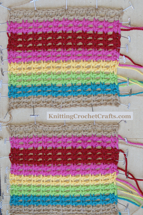 Here you can see a work-in-progress photo of an alternate colorway of the rainbow crochet fingerless gloves. In this picture, I've finished crocheting the gloves, and they are in the process of being blocked. After the blocking is complete, I will need to sew the side seams.