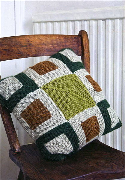 Color Blocks Pillow Knitting Pattern: Don't you think this pillow is simply stunning, with its sophisticated blocks of garter stitch? This pattern is included in Martin Storey's Afghan Knits. There's also a similar blanket pattern included in the book. 