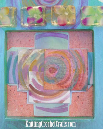 Resin Crafts: This Collage Art Piece Features Handmade Paper, Spin Art Spirals and a Series of 4 Molded Resin Cubes With Tiny Silk Hydrangea Flowers Embedded Inside