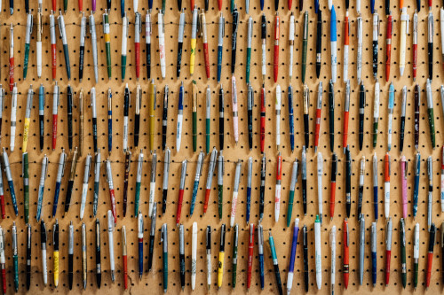 This craft room features a pegboard holding a collection of pens. Photo courtesy of Andrew Seaman.