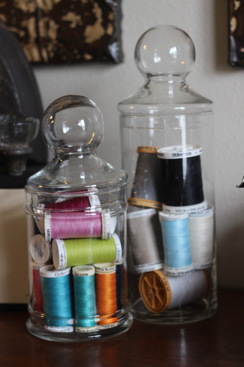 Craft Room Ideas: Store Thread Spools in Pretty Lidded Jars. Photo Courtesy of Jen Theodore.