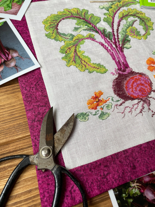 Gardening Themed Cross Stitch Piece Featuring Beets. Photo Courtesy of Gio Gix.