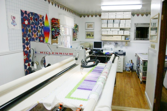 Longarm Quilting Machine With a Quilt on a Frame -- Photo Contributed by Jessica Hartman, Courtesy of Wikimedia Commons