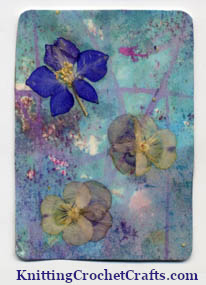 Dried Flowers Crafts: Decoupage Art Featuring a Collage of Dried Pansies and Flowers