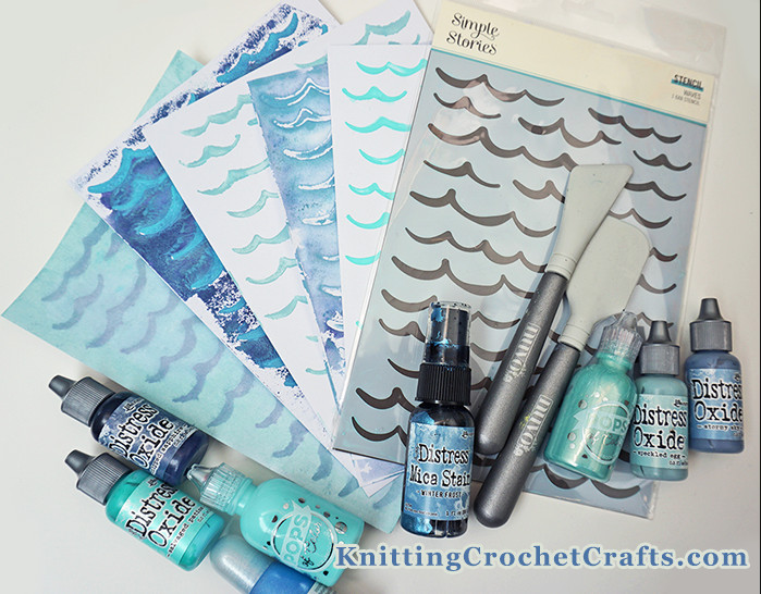 Waves Stencil From the Simple Vintage Seas Collection by Simple Stories Plus Various Media You Can Use With Stencils as a Paint Alternative: Distress Oxide Reinkers, Scrapbook.com's Pops of Color, Brilliance Reinker, and Distress Mica Spray by Tim Holtz for Ranger Industries -- plus stenciling tools including  Nuvo Spatulas.