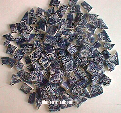 Mosaic Tiles That Were Hand Cut from Vintage Blue and White Transferware Plates Using Tile Nippers