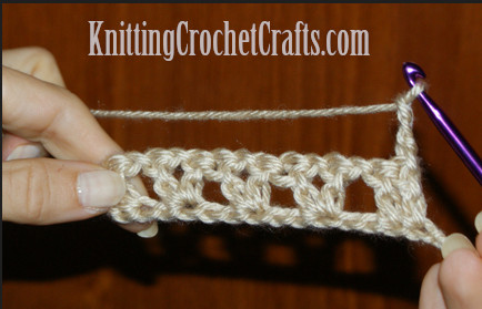 Turn the work over so you can work the second row by crocheting back across the first row.