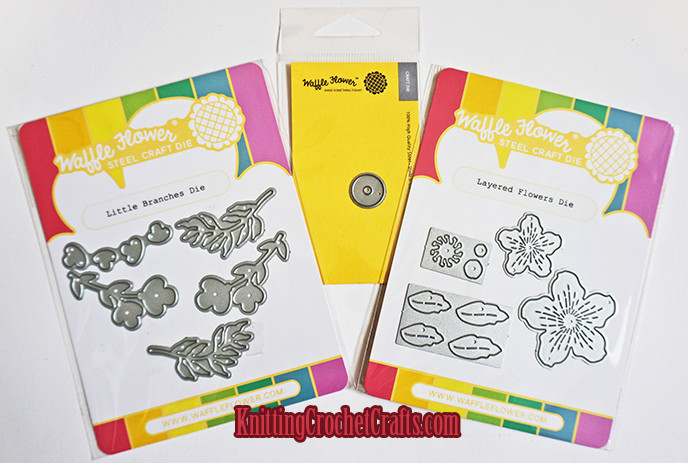 Affordable Craft Die Sets by Waffle Flower Crafts. Pictured from left to right: The Little Branches Craft Die set; the Tag Hole Reinforcer Die; and the Small Layered Flowers Die Set, all by Waffle Flower Crafts.