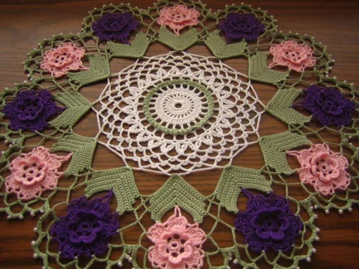 From 1998 until 2008, I used to sell vintage crochet patterns and other interesting items on eBay. I had an ultra talented customer named Demet who occasionally bought pattern books from me. Demet is seriously talented, and doilies were her favorite projects to crochet. She took this photo of one of her projects and shared it with me. I am sorry to say that I have long since forgotten which pattern book this beautiful doily pattern came from. However, if you are looking for challenging crochet doily patterns that take some expertise to execute well, you should really be looking at vintage doily patterns. 
