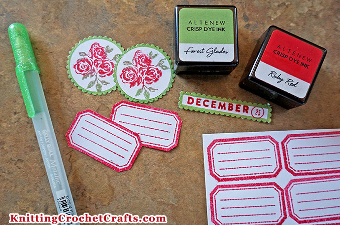 Altenew Crisp Dye Inks pictured with a Green Metallic Sakura Gelly Roll Pen and Labels I Made Using the Maggie Holmes Round Trip Clear Stamp Set and Stamped Images From Maggie Holmes' Day-To-Day Clear Stamps,