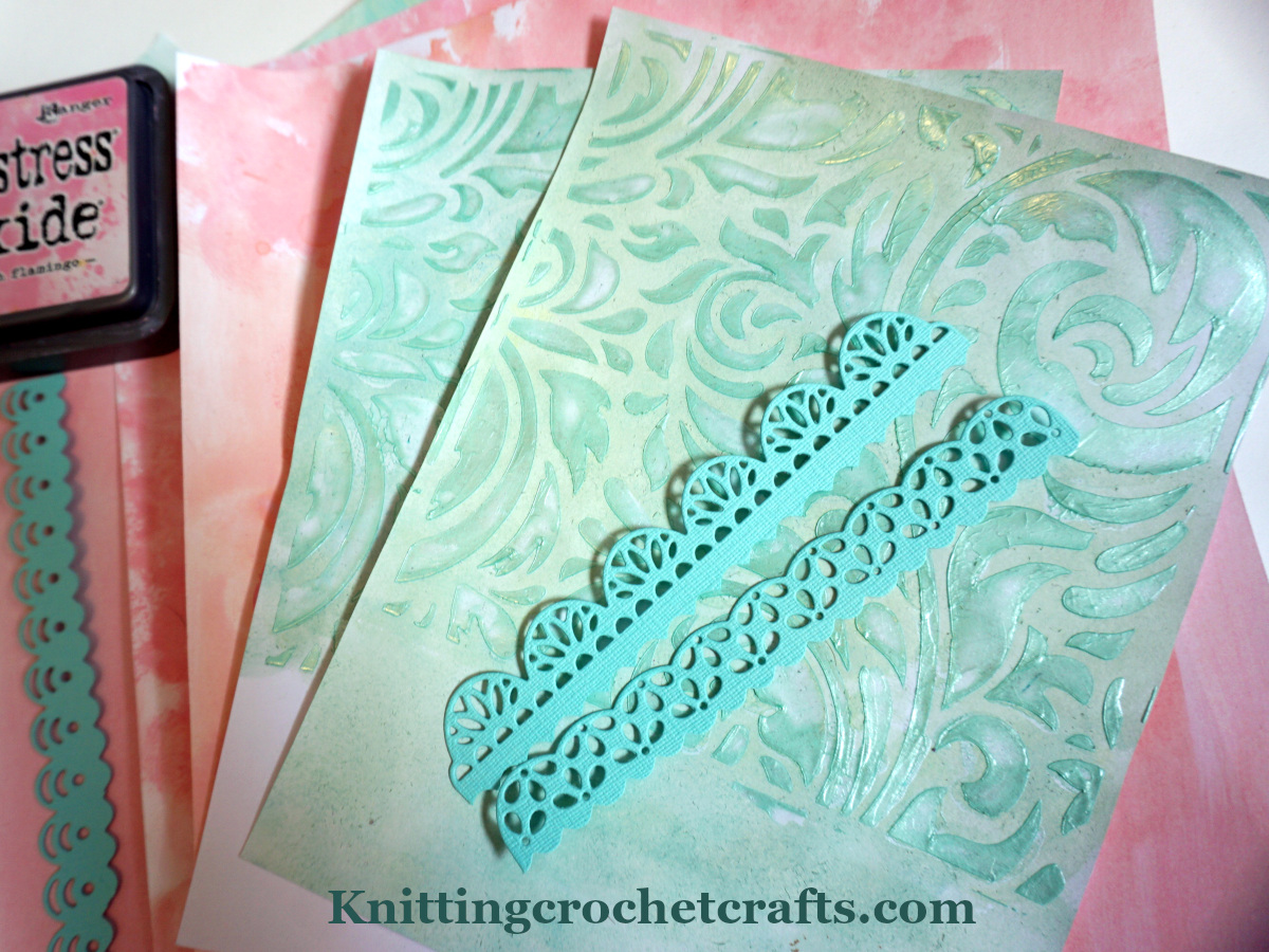 Here you can see papers that I first ink blended using Distress Oxide inks, and then stenciled using Altenew's Elegant Swirls stencil.