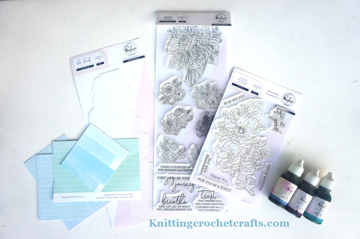 Paper Craft Supplies by Pinkfresh Studio: Life Is Good Stamp Set; Joyful Bouquet Stamp Set; Layered Clouds Slim Stencil; Regal Kiss Reinker; Mermaid Cove Reinker; Blue Jay Reinker; and Paper Scraps from the 'Happy Heart' paper collection (The 'New Beginning' and 'Celebrate You' designs)