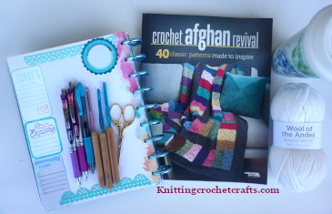 Crochet Afghan Revival Pictured With Craft Supplies Including Wool of the Andes Yarn by Knit Picks; Susan Bates Bamboo Handled Crochet Hooks; Pentel Energel Pens; and a Classic Happy Planner by Me & My Big Ideas