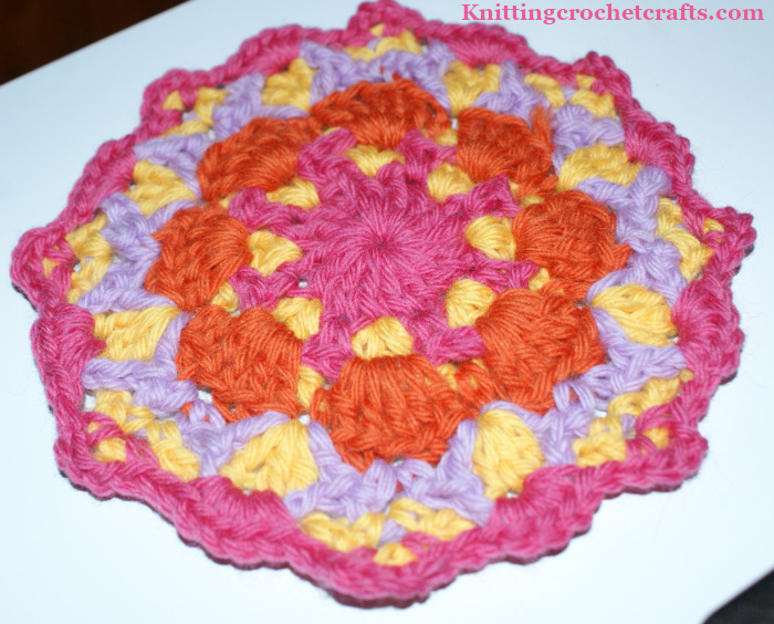 Medallion Motif from Tammy Hildebrand's Kaleidoscope Pattern. This crochet motif pattern is published in Robyn Chachula's book called Unexpected Afghans, published by Leisure Arts. Crocheted and photographed by Amy Solovay.